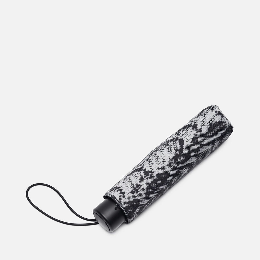 CARHARTT WIP Guarda-chuva snake camo compact